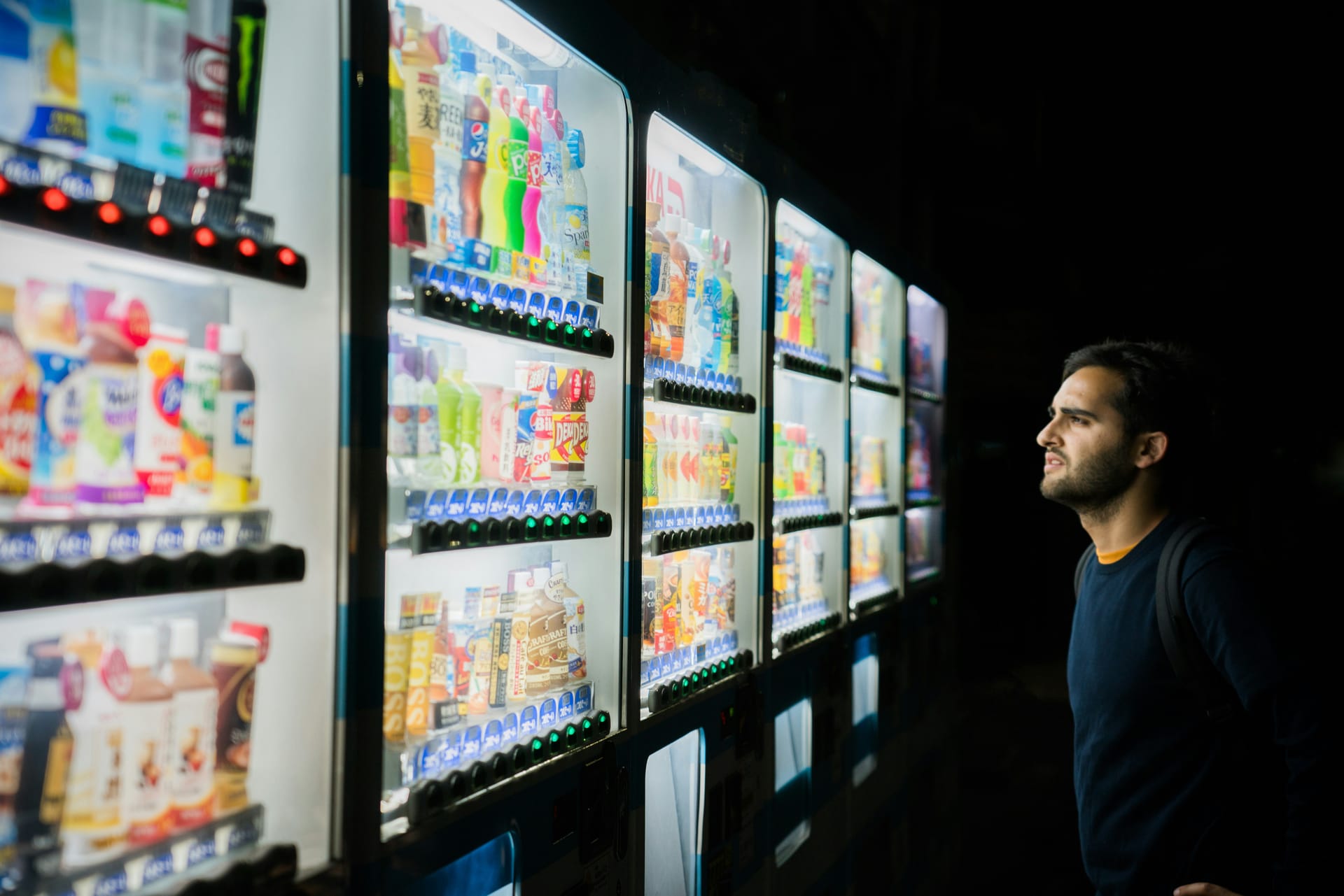 Person browsing vending machines